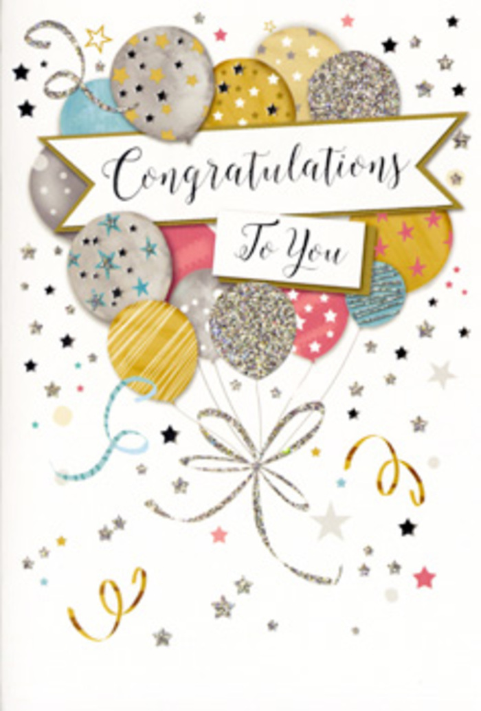 The congratulations card pictured here radiates a polished, joyful elegance, as though it's just been propped next to a celebratory bouquet in a Crayford living room. At its heart is a generous cluster of balloons, arranged almost like a floral display in the sky. Soft metallic tones of warm gold, cool silver, champagne, pastel blue, rose pink and muted grey are layered so the colours blend naturally, with no single shade overpowering the others. Each balloon is decorated differently: some wear delicate stripes, others are scattered with tiny star motifs, and a few are dusted with fine glitter that seems to sparkle like the lights along Crayford's main roads on a festive evening. Slender curling ribbons stream from the base of the balloons, rendered in glinting gold and silver lines that twist and loop with a calligrapher's grace. Draped across the centre, a banner with slightly rolled ends carries the words Congratulations To You in flowing script, the letters balanced and refined as if carefully penned by hand. Around the central design, a constellation of miniature stars, confetti-like dots and whimsical curls of ribbon drift across a pale, barely tinted background, echoing the carefree joy of a party in full swing. You sense the texture of the card stock: smooth and sturdy, with raised glitter elements offering subtle tactile contrast. It feels timeless and versatile, suitable for graduations, promotions, or any triumph worth celebrating in Crayford, especially when paired with a fresh, celebratory arrangement from a local florist who understands how to match flowers to such an uplifting, sophisticated card.